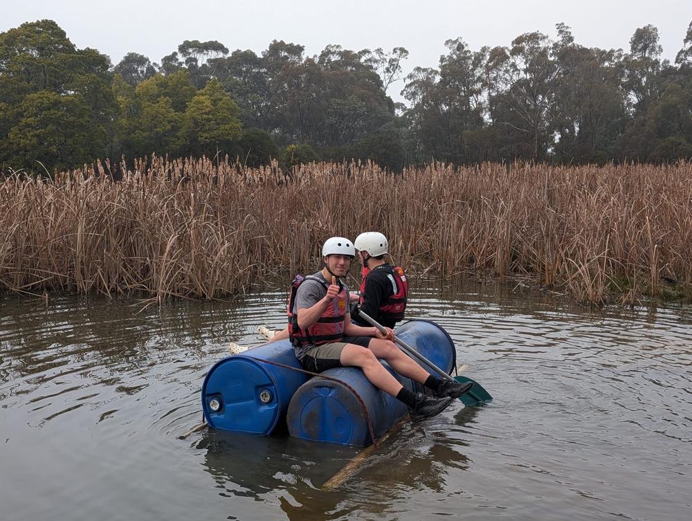 Students on a raft at Year 9 camp